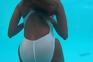 Ebony see-through swimsuit underwater