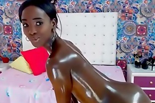 Jaw-dropping shining oily ebony college girl masturbates and squirts